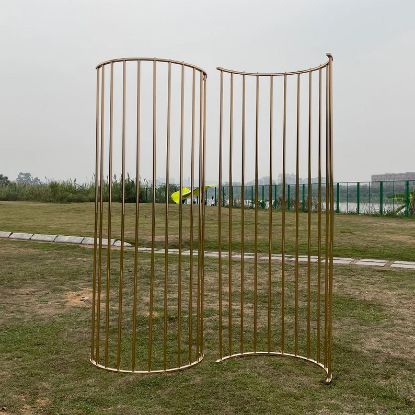 Picture of Gold Undulating Curved Arch with Vertical Bars - 10 Feet Tall