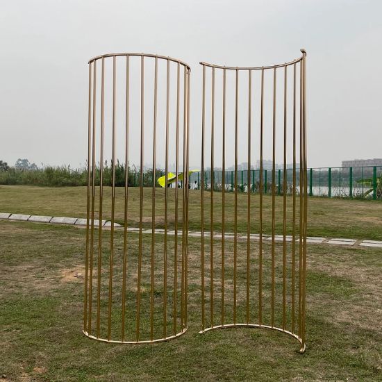 Picture of Gold Undulating Curved Arch with Vertical Bars - 10 Feet Tall